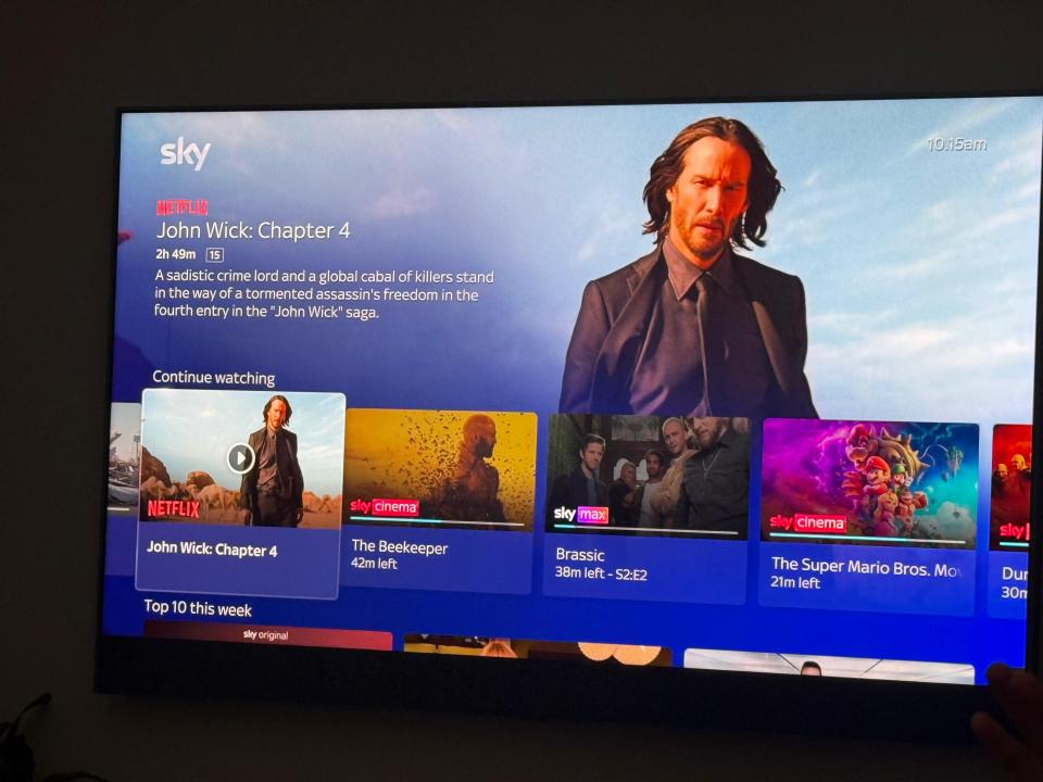 Sky TV screen showing John Wick: Chapter 4 and other movies.