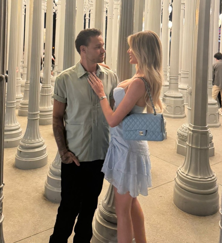 Kate Cassidy and Liam Payne at an outdoor art installation.