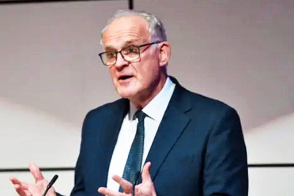 Chief Inspector of Borders John Tuckett speaking at a podium.