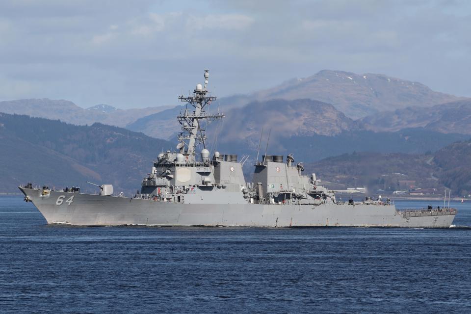 USS Carney (DDG-64), an Arleigh Burke-class destroyer, at sea.