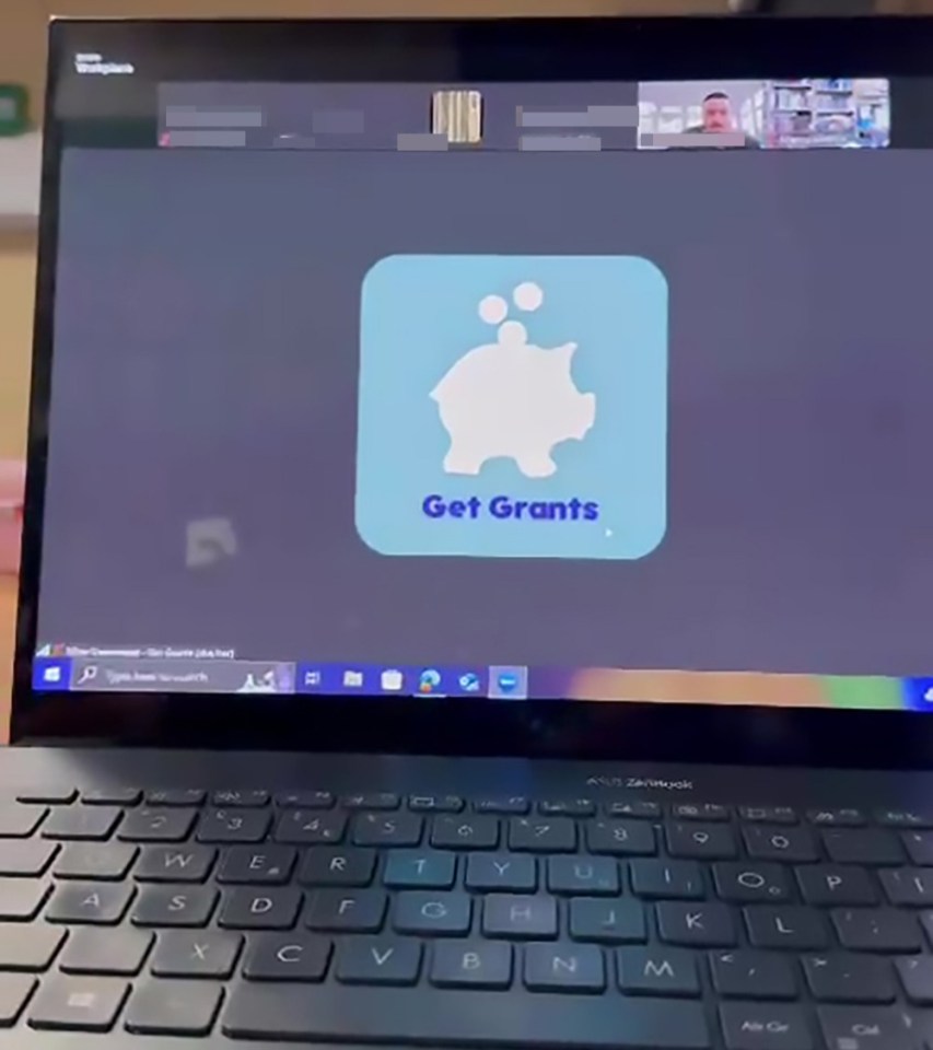 Laptop displaying the Get Grants logo during an online meeting.