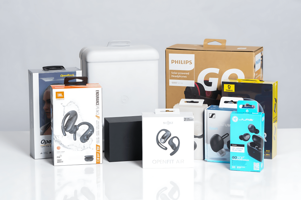 Several boxes of wireless headphones.