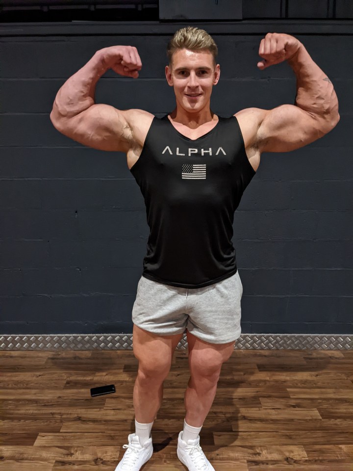 Bodybuilder Matty Campbell flexing his biceps.