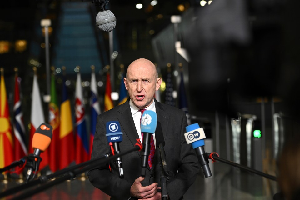 Britain's Defense Secretary John Healey speaking to the media.