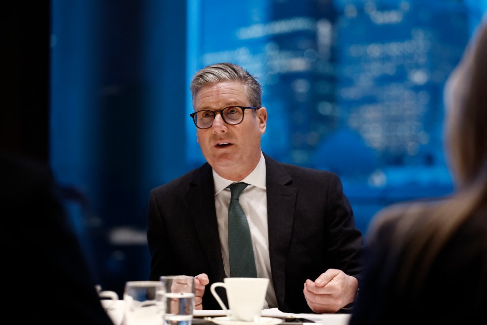 Keir Starmer speaking at a business meeting.