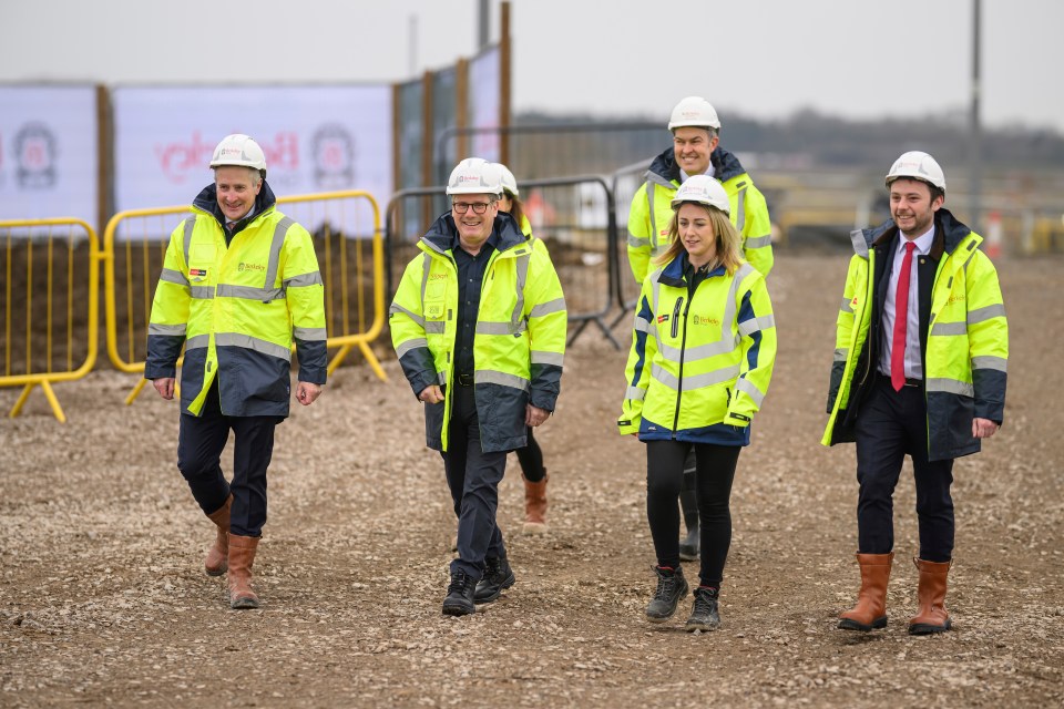 Prime Minister Keir Starmer touring a housing construction site.