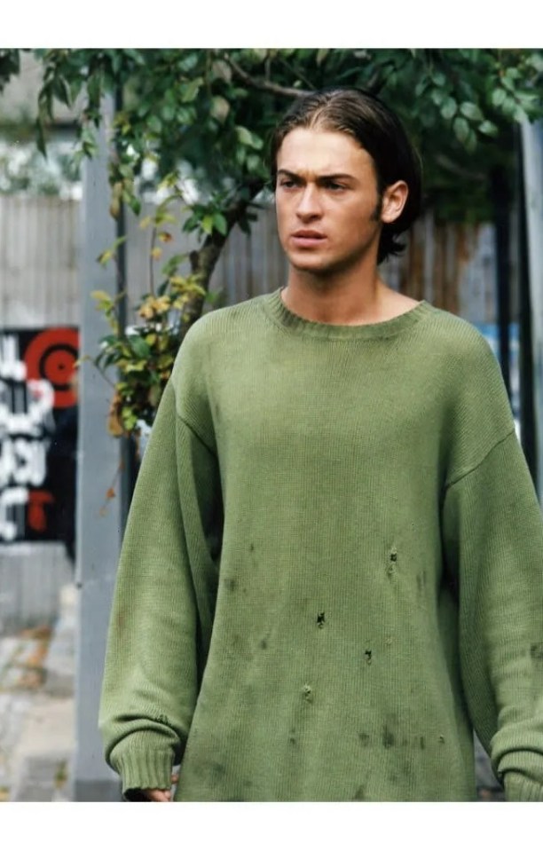 Photo of Paul Nicholls wearing a green sweater.