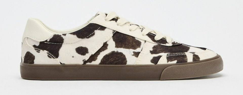 Cow print sneakers.