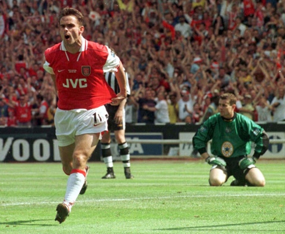 Marc Overmars celebrating a goal.