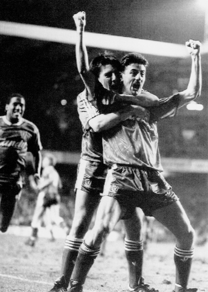 Ian Rush and Peter Beardsley celebrating a goal.