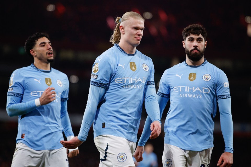 Manchester City players after a goal.