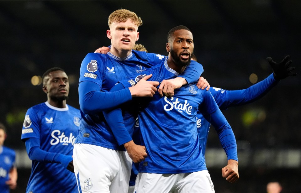 Everton players celebrating a goal.