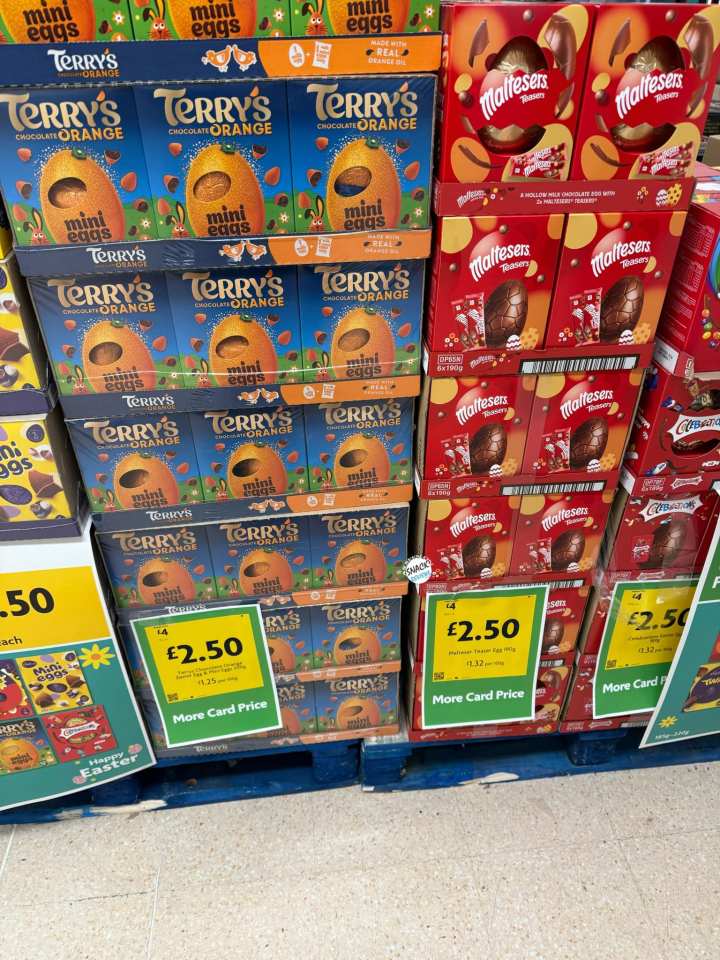 Supermarket display of Terry's Chocolate Orange and Maltesers Easter eggs.