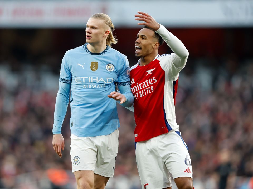 Arsenal's Martin Odegaard celebrates a goal with teammates Declan Rice and Leandro Trossard.