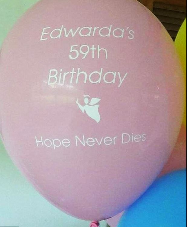 Pink balloon commemorating Edwarda's 59th birthday; "Hope Never Dies" printed on balloon.