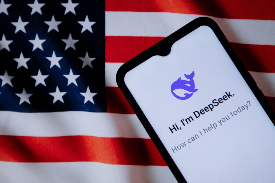 Illustration of the DeepSeek app on a phone screen against an American flag.