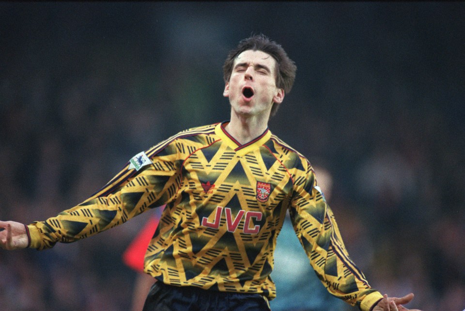 Alan Smith celebrates a goal for Arsenal.