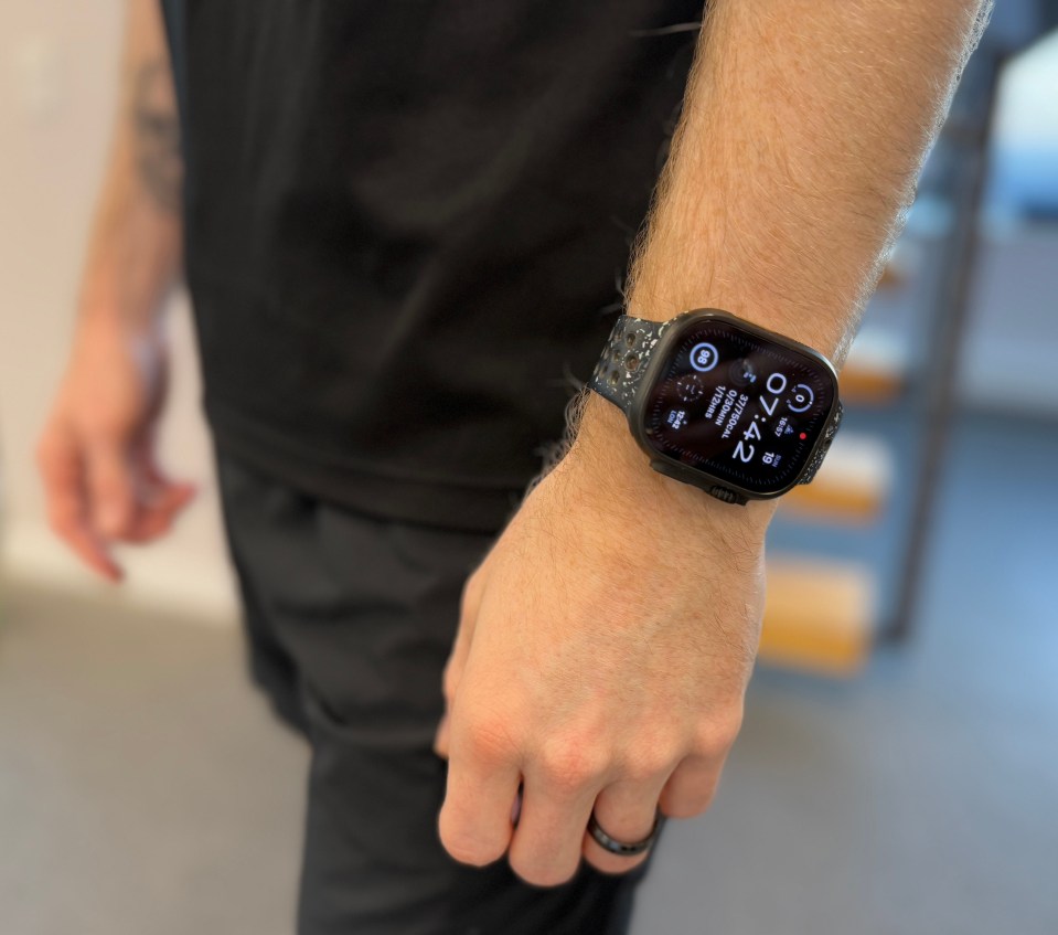 Person wearing a smartwatch.