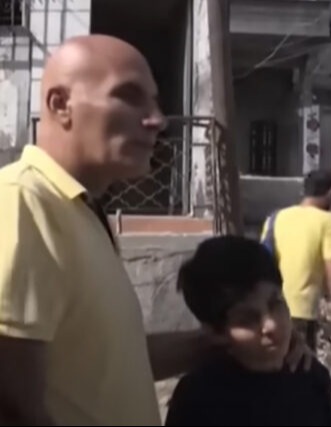 Khalil Abu Shammal with a child and then on television.