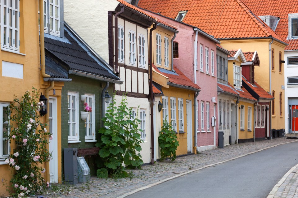 Row of colorful houses in Aalborg's old town.