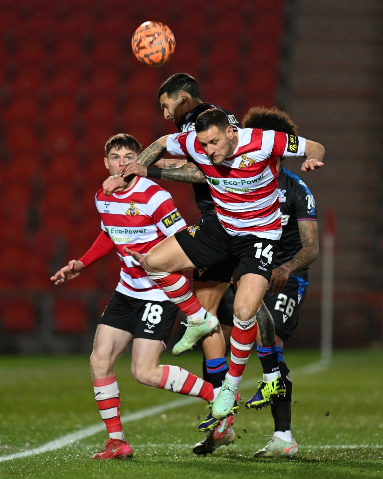 Ethan Ennis and Billy Sharp take on Palace's Daniel Munoz