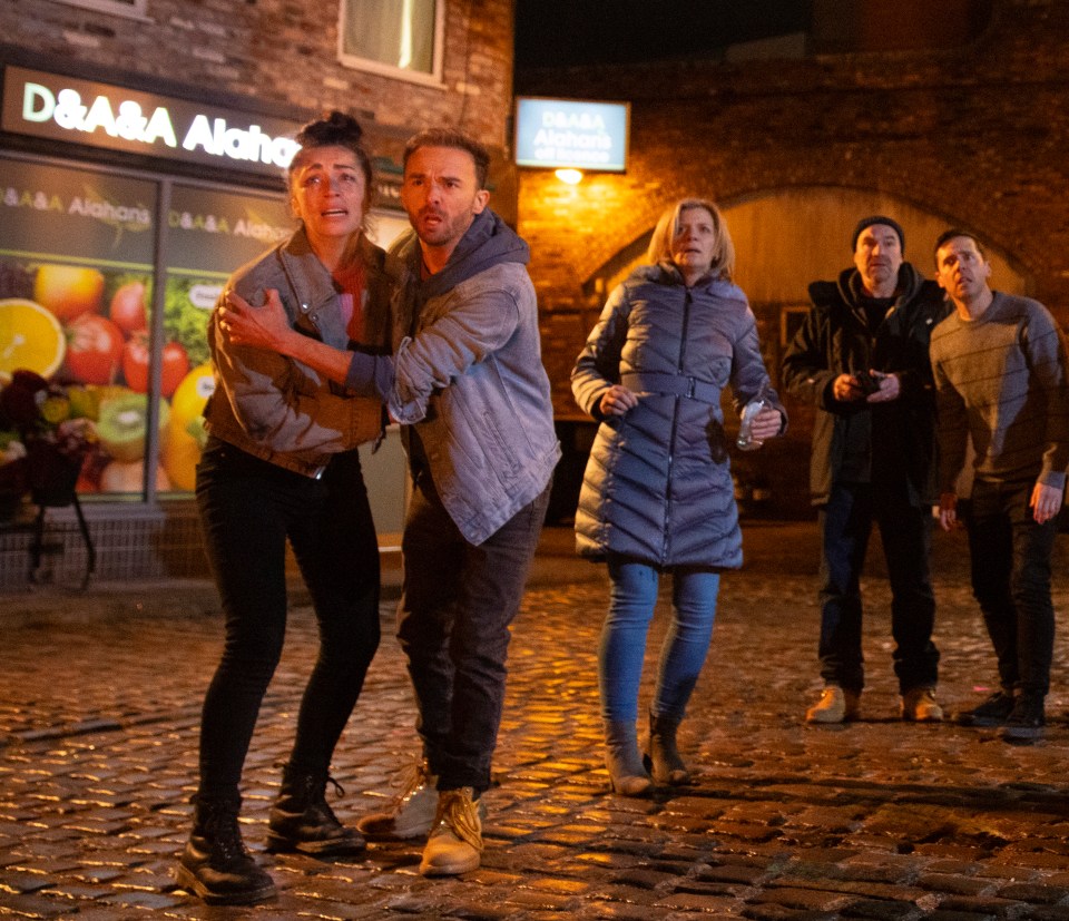 Scene from Coronation Street showing characters reacting to an explosion.