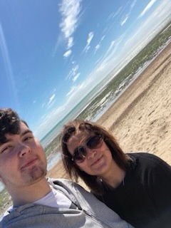 Photo of a mother and son at the beach.