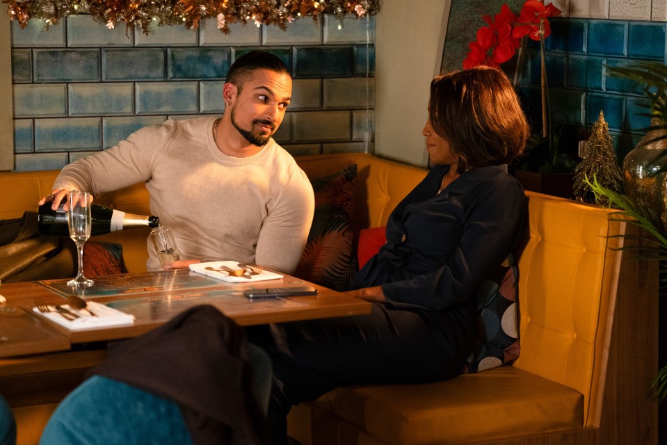 Denise Fox and Aaron Thiara at a restaurant table.