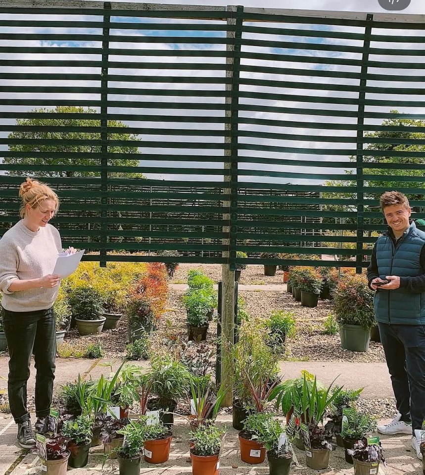 Dig co-founders reviewing plants.