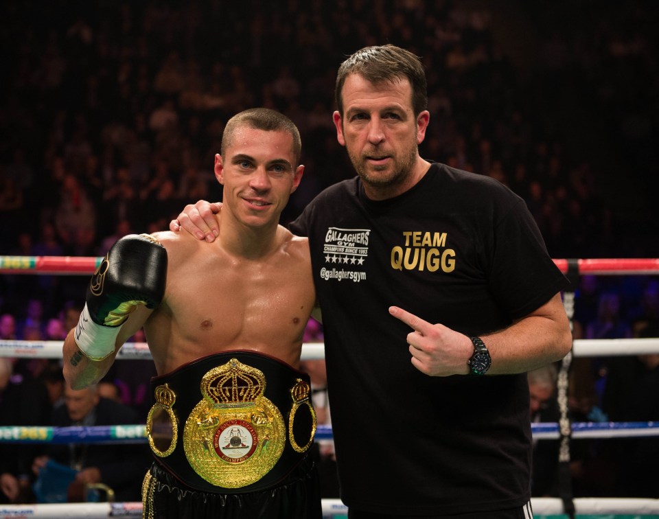 Scott Quigg with his trainer and WBA World Super Bantamweight Championship belt after a 2nd round stoppage.