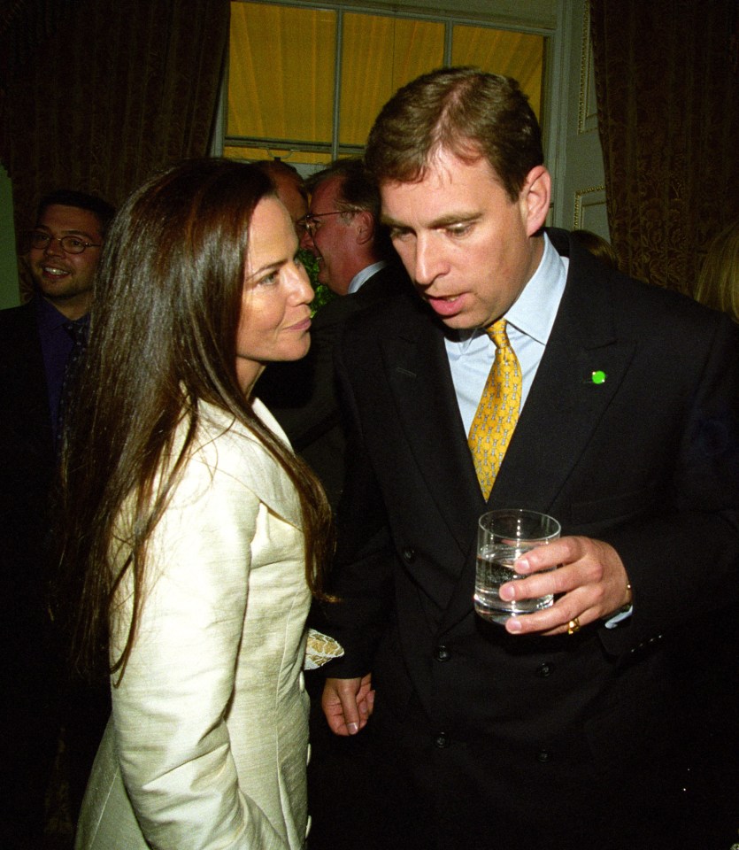 Prince Andrew and Koo Stark at a champagne reception.