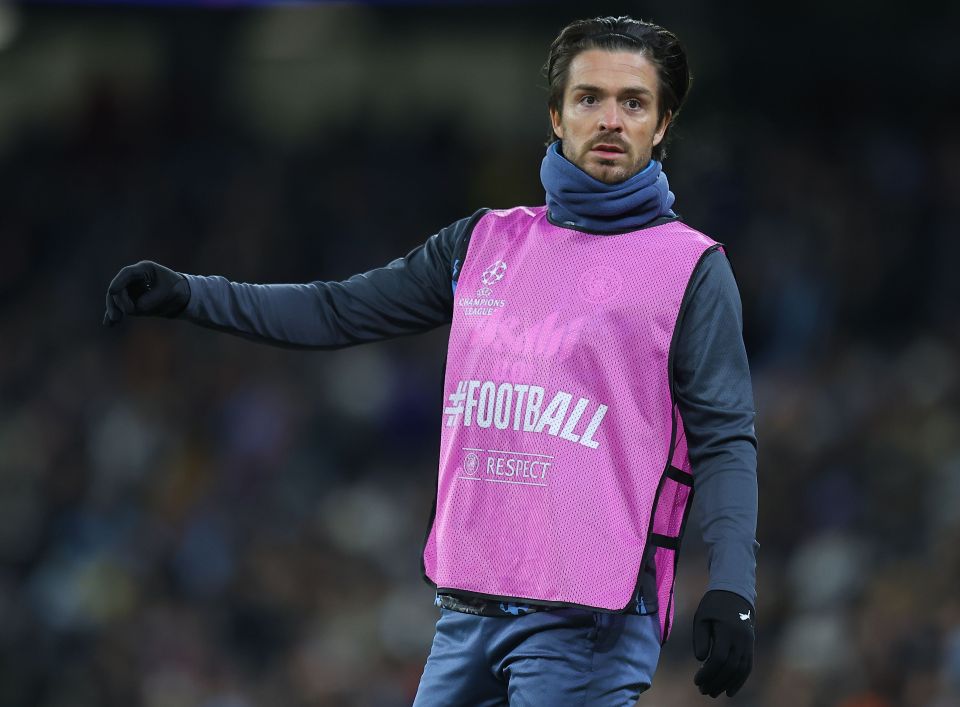 Jack Grealish of Manchester City wearing a pink bib.