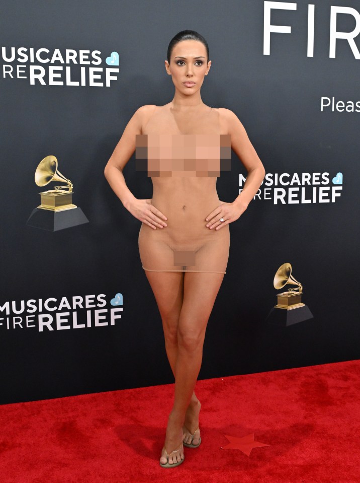 Bianca Censori at the Grammy Awards in a sheer nude dress.  (Image contains nudity)