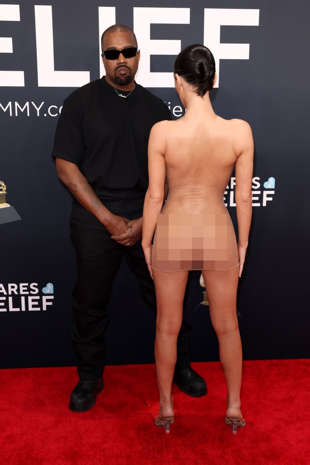 Kanye West and Bianca Censori at the Grammy Awards.  (Image contains nudity.)