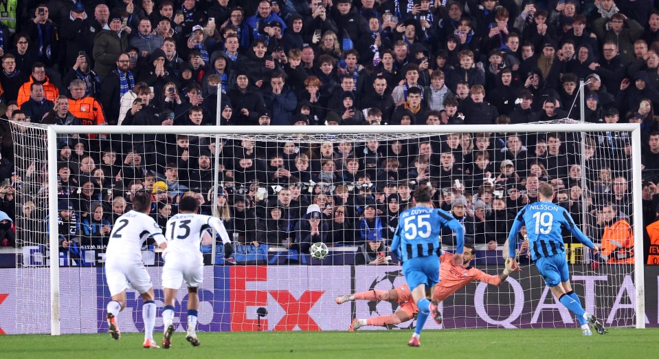 Gustaf Nilsson of Brugge scoring a penalty kick during a UEFA Champions League match.