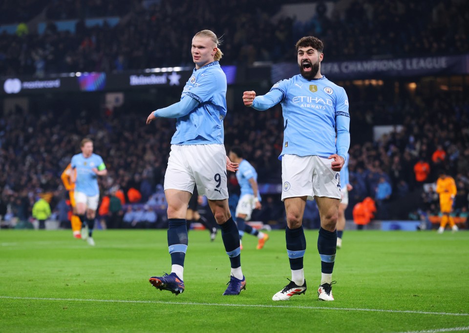 Erling Haaland and Josko Gvardiol of Manchester City celebrating a goal.