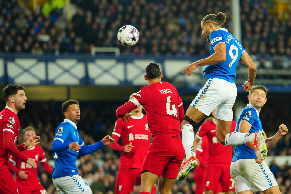 Everton's Dominic Calvert-Lewin heads the ball during a soccer match.