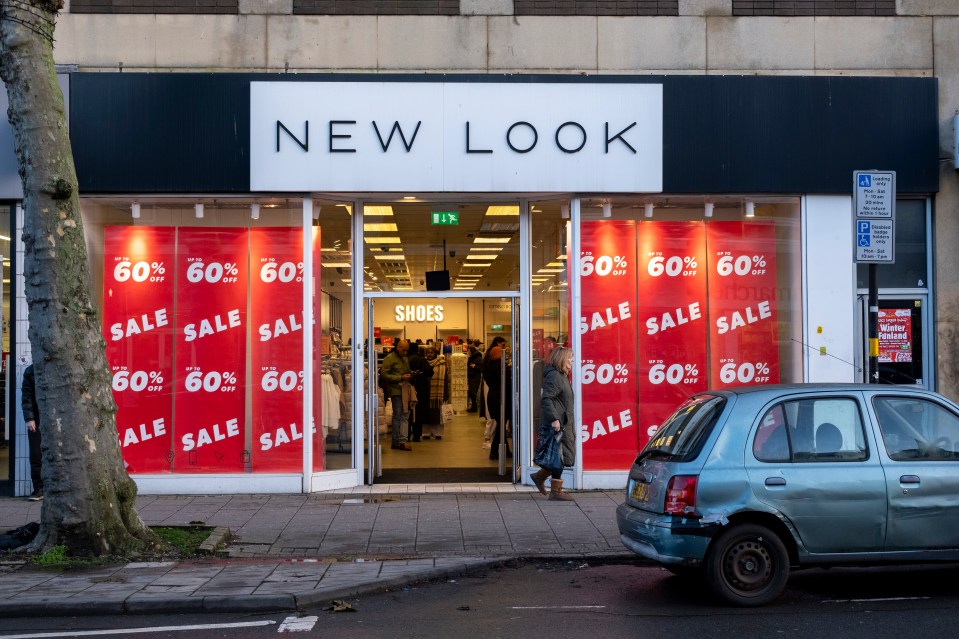 Exterior of a New Look clothing store with a 60% off sale.