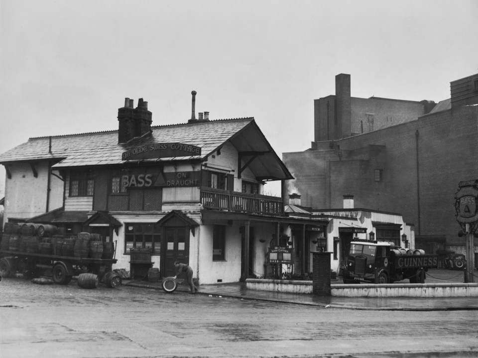 Black and white photo of Ye Olde Swiss Cottage pub in London, 1948.