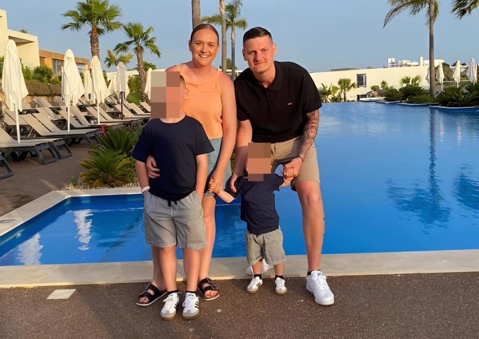 Family of four by a pool in Spain.