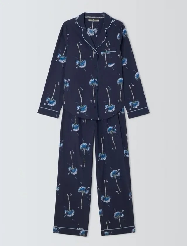 Navy blue pajama set with dandelion print.