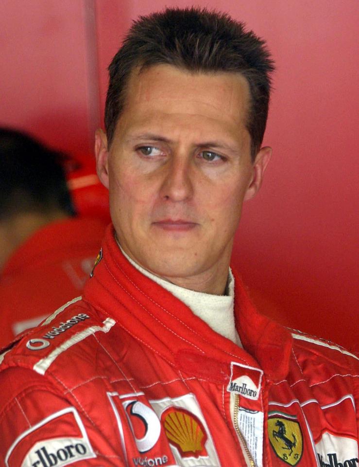 Michael Schumacher and Jean Todt walking at the Monaco Grand Prix.