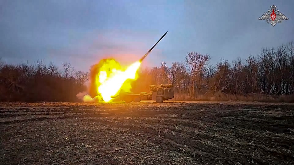 A Russian Uragan rocket launcher firing toward a Ukrainian position.