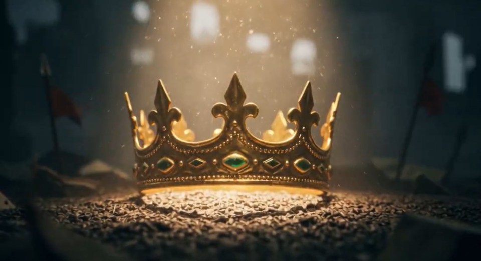 A golden crown on the ground.