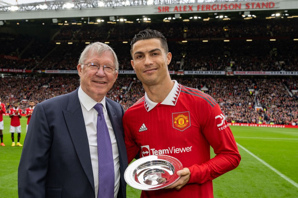 Sir Alex Ferguson congratulates Cristiano Ronaldo at Old Trafford.