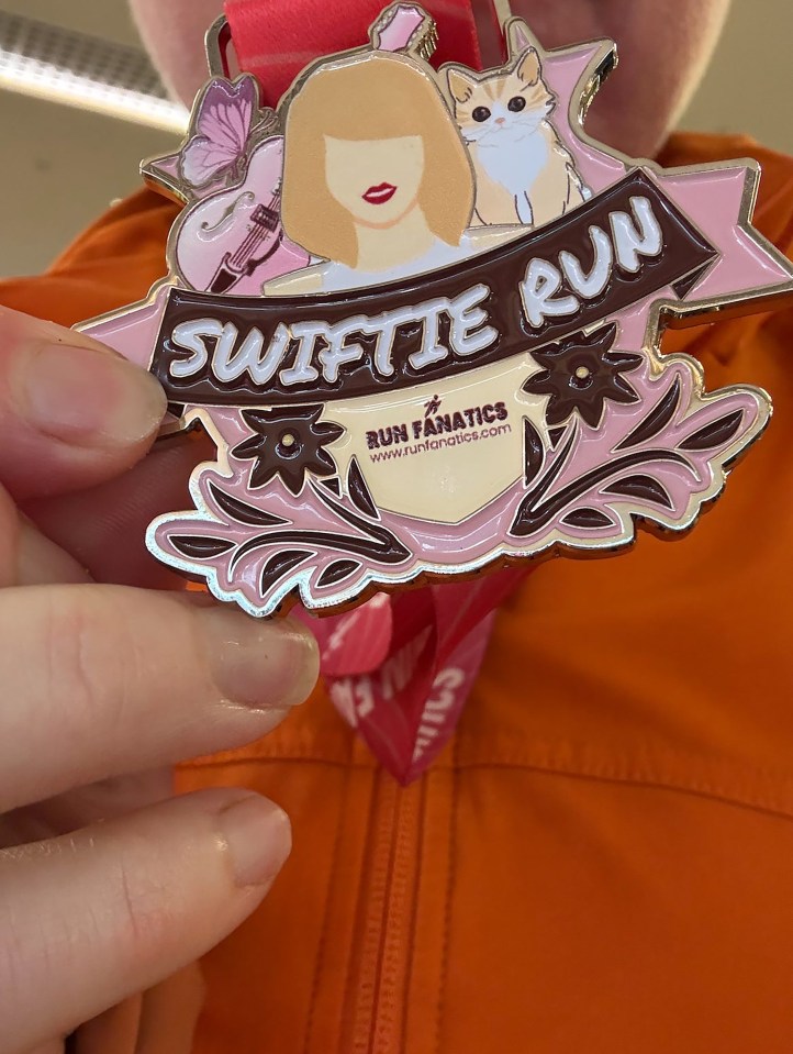 Swiftie Run 5k fun run medal.