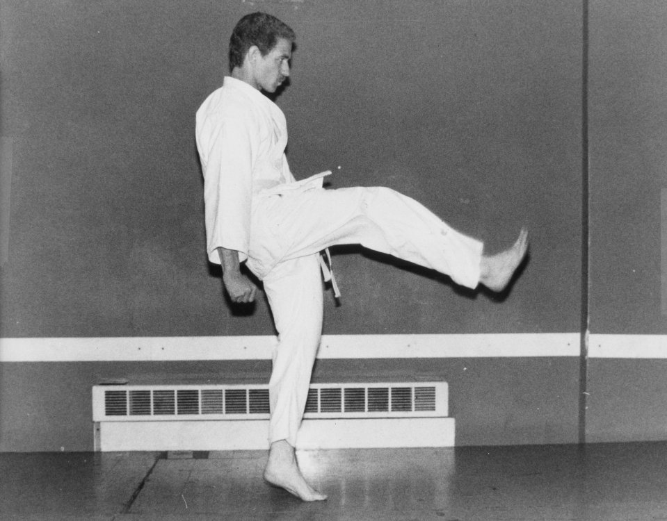 Black and white photo of Gary Hopkins, a murder suspect, practicing martial arts.