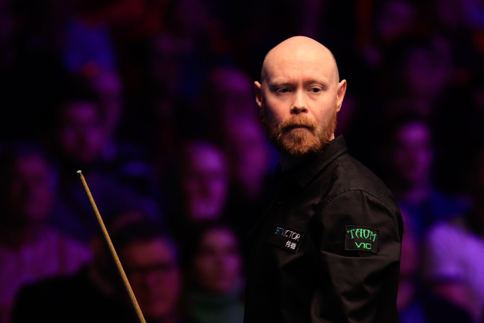 Gary Wilson of England during a snooker match.