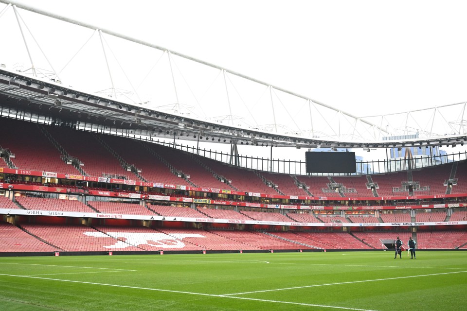 Empty Emirates Stadium before a soccer match.