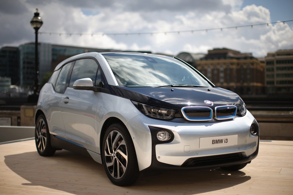 A silver BMW i3 electric car.